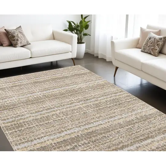 Gray and Ivory Abstract Power Loom Area Rug Photo 1