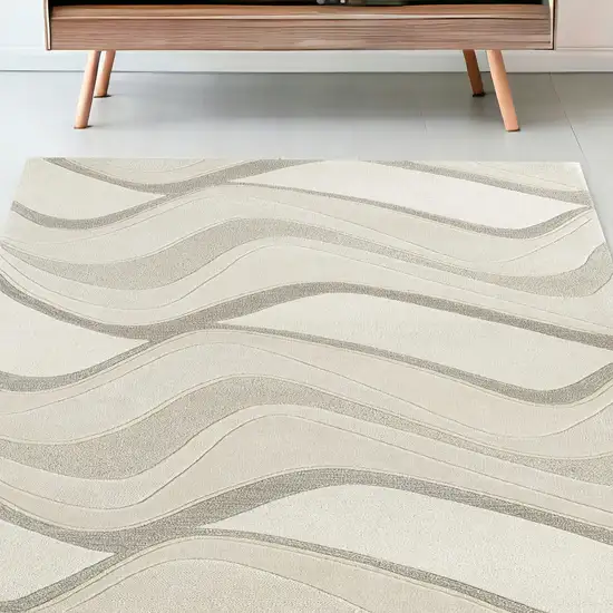 5'X8' Ivory Hand Tufted Abstract Waves Indoor Area Rug Photo 1