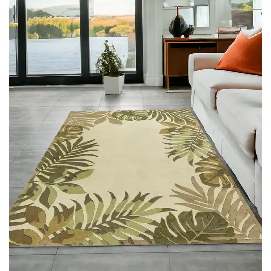 5'X8' Ivory Hand Tufted Bordered Tropical Leaves Indoor Area Rug Photo 1