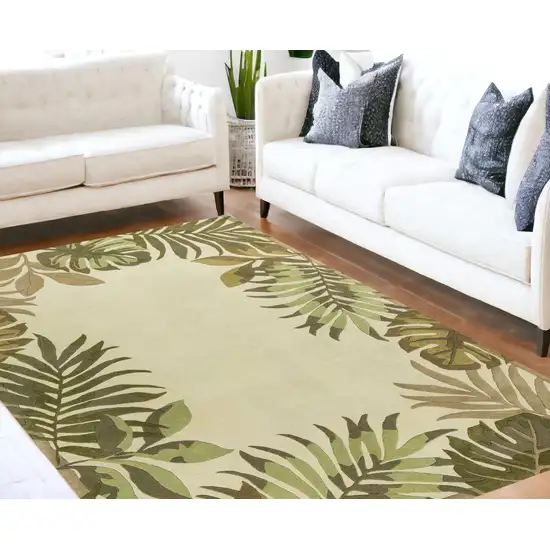 8'X11' Ivory Hand Tufted Bordered Tropical Leaves Indoor Area Rug Photo 1