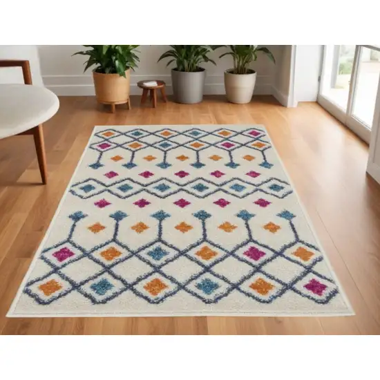 Ivory And Blue Geometric Area Rug Photo 2