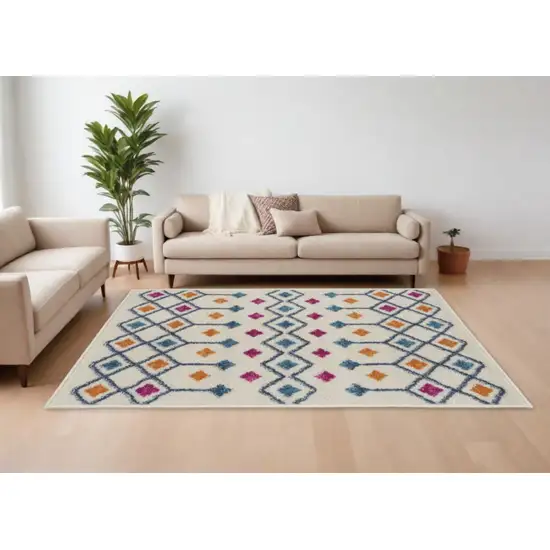 Ivory And Blue Geometric Area Rug Photo 2