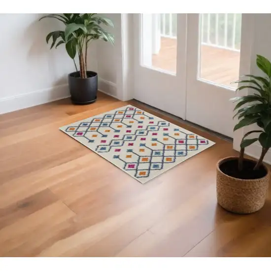 Ivory And Blue Geometric Area Rug Photo 2