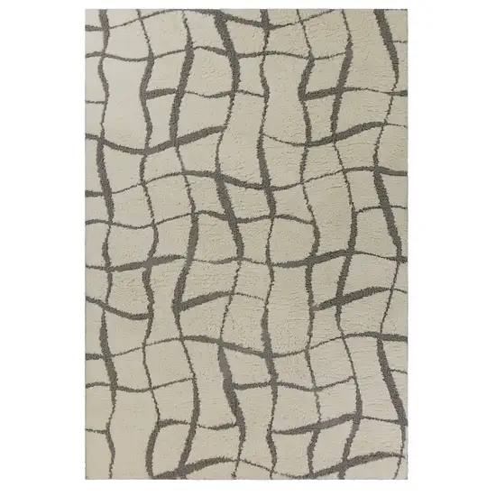 Ivory Machine Woven Abstract Indoor Shag Rug Photo 1