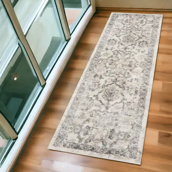 7' Ivory Machine Woven Distressed Floral Traditional Indoor Runner Rug Photo 1