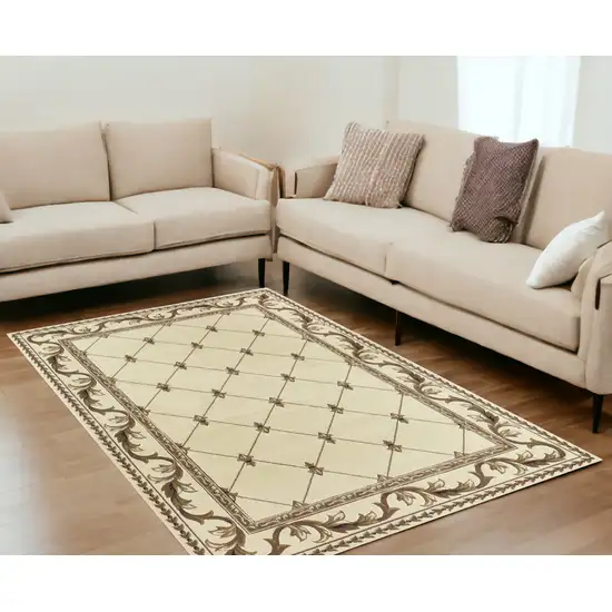 5'X8' Ivory Machine Woven Hand Carved Fleur De Lis Indoor Area Rug Photo 1