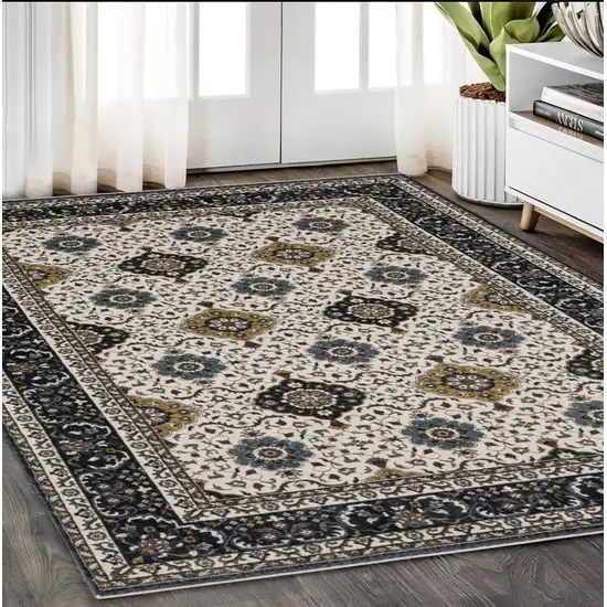 Ivory Medallion Area Rug With Fringe Photo 1