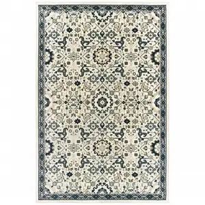 Photo of Ivory Navy And Gold Oriental Power Loom Stain Resistant Area Rug