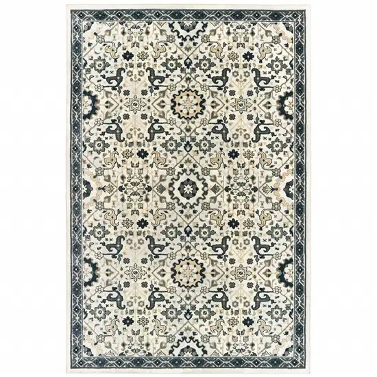 Ivory Navy And Gold Oriental Power Loom Stain Resistant Area Rug Photo 1