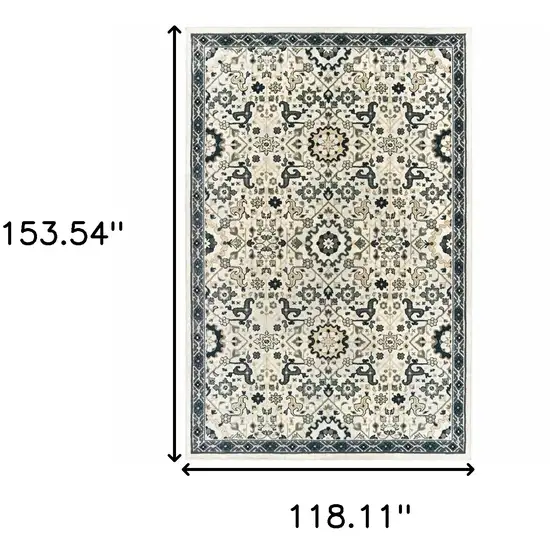 Ivory Navy And Gold Oriental Power Loom Stain Resistant Area Rug Photo 7