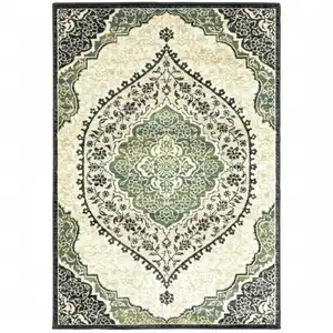 Photo of Ivory Navy And Green Oriental Power Loom Stain Resistant Area Rug