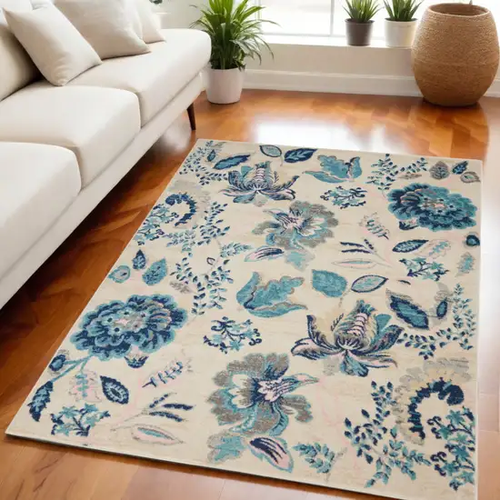 Ivory Navy Blue And Light Blue Floral Area Rug Photo 1