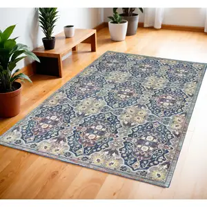 Photo of Ivory Navy Blue and Yellow Floral Distressed Non Skid Area Rug