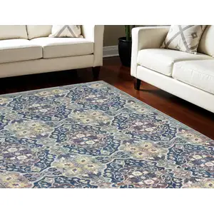 Photo of Ivory Navy Blue and Yellow Floral Distressed Non Skid Area Rug