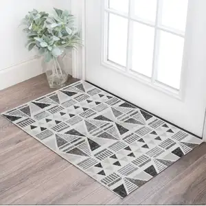 Photo of Ivory Or Mocha Aztec Pattern Rug