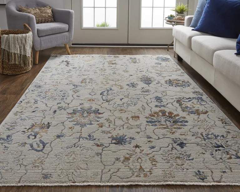 Ivory Orange And Blue Floral Power Loom Distressed Area Rug With Fringe Photo 3