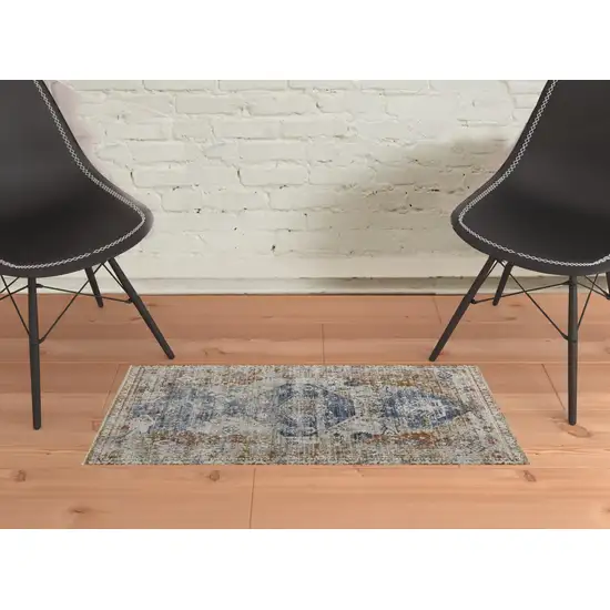 Ivory Orange And Blue Floral Power Loom Distressed Area Rug With Fringe Photo 4