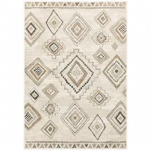 Photo of Ivory Orange Tan Black And Grey Southwestern Power Loom Stain Resistant Area Rug