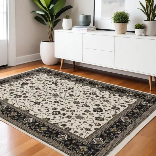 Ivory Oriental Area Rug With Fringe Photo 1