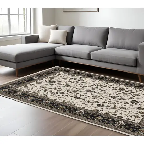 Ivory Oriental Area Rug With Fringe Photo 1