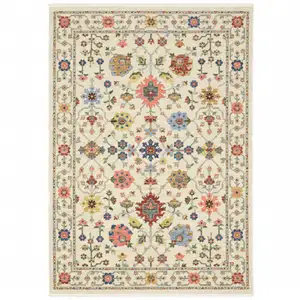 Photo of Ivory Oriental Power Loom Stain Resistant Area Rug With Fringe