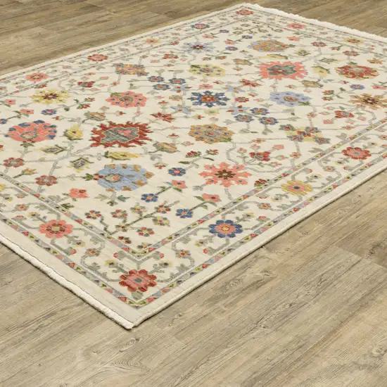 Ivory Oriental Power Loom Stain Resistant Area Rug With Fringe Photo 6