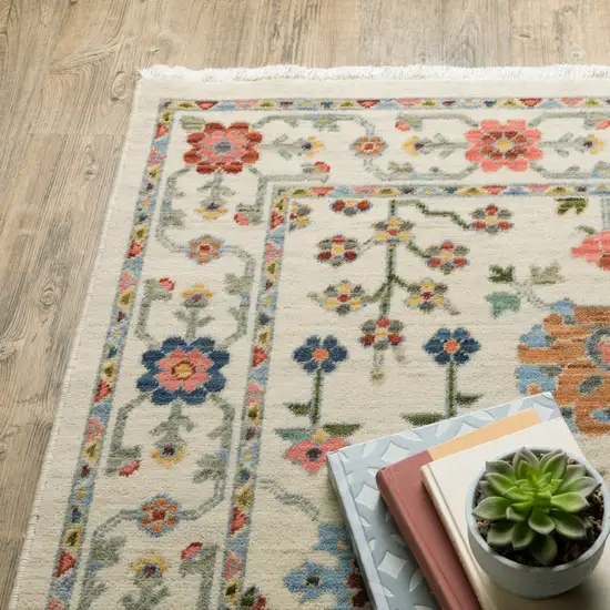 Ivory Oriental Power Loom Stain Resistant Area Rug With Fringe Photo 8