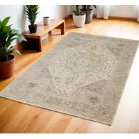 Photo of Ivory Pink And Gray Floral Distressed Area Rug