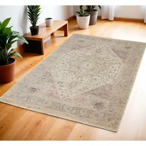 Photo of Ivory Pink And Gray Floral Distressed Area Rug