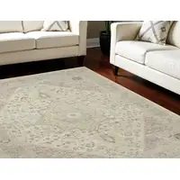 Photo of Ivory Pink And Gray Floral Medallion Distressed Area Rug