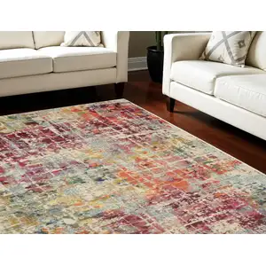 Photo of Ivory Pink and Orange Abstract Distressed Non Skid Area Rug