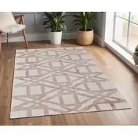 Photo of Ivory Pink and Tan Wool Geometric Hand Tufted Area Rug