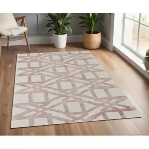 Photo of Ivory Pink and Tan Wool Geometric Hand Tufted Area Rug