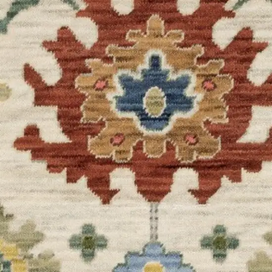 Ivory Red And Blue Oriental Area Rug With Fringe Photo 7