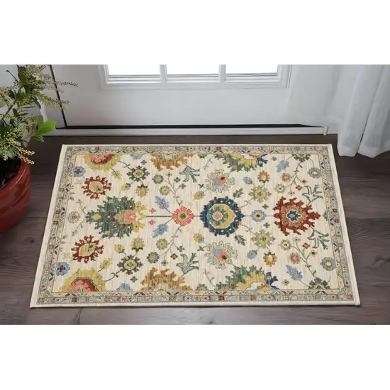 Ivory Red And Blue Oriental Area Rug With Fringe Photo 1