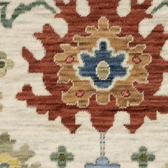 Ivory Red And Blue Oriental Area Rug With Fringe Photo 6