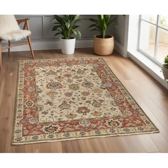 Red and Ivory Wool Floral Hand Knotted Area Rug Photo 1