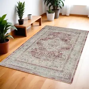 Photo of Ivory Red And Brown Floral Distressed Area Rug