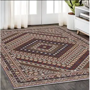 Photo of Ivory Red And Tan Diamond Area Rug With Fringe