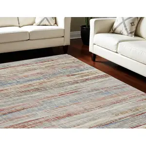 Photo of Ivory Red and Blue Abstract Non Skid Area Rug