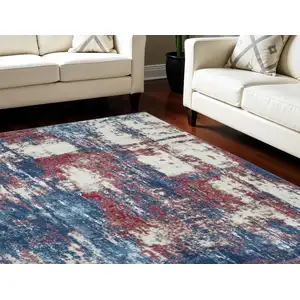 Photo of Ivory Red and Blue Abstract Non Skid Area Rug