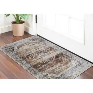 Photo of Ivory Red and Blue Abstract Power Loom Worn Faded Area Rug