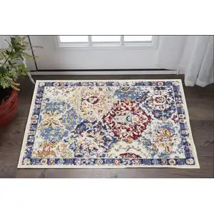 Photo of Ivory Red and Blue Ogee Distressed Non Skid Area Rug