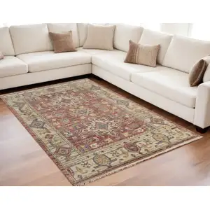 Photo of Ivory Red and Gold Wool Oriental Hand Knotted Area Rug With Fringe