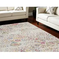 Photo of Ivory Red and Light Blue Damask Distressed Area Rug