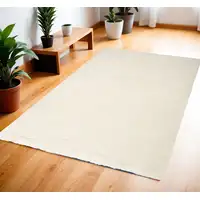 Photo of Ivory Shag Area Rug