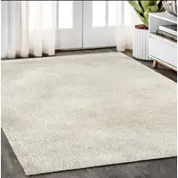 Photo of Ivory Shag Hand Tufted Area Rug