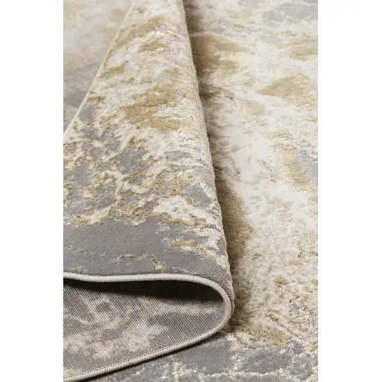 Ivory Silver And Gold Abstract Area Rug Photo 9