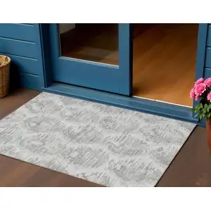 Photo of Ivory Silver And Taupe Abstract Washable Indoor Outdoor Area Rug