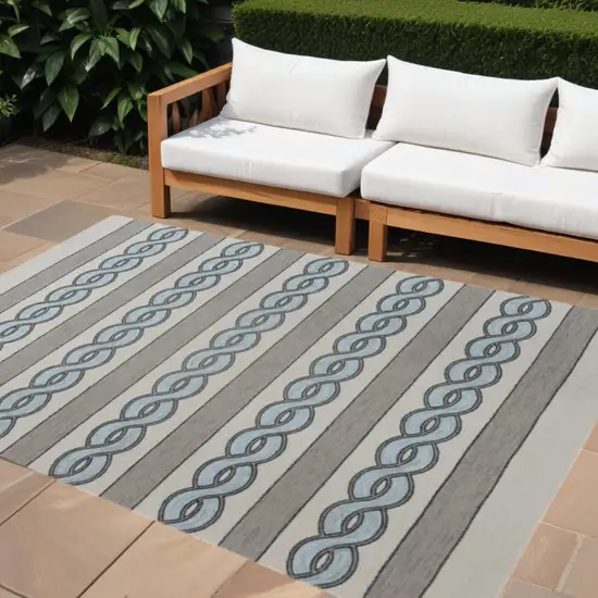 Ivory and Blue Abstract Indoor Outdoor Area Rug Photo 1